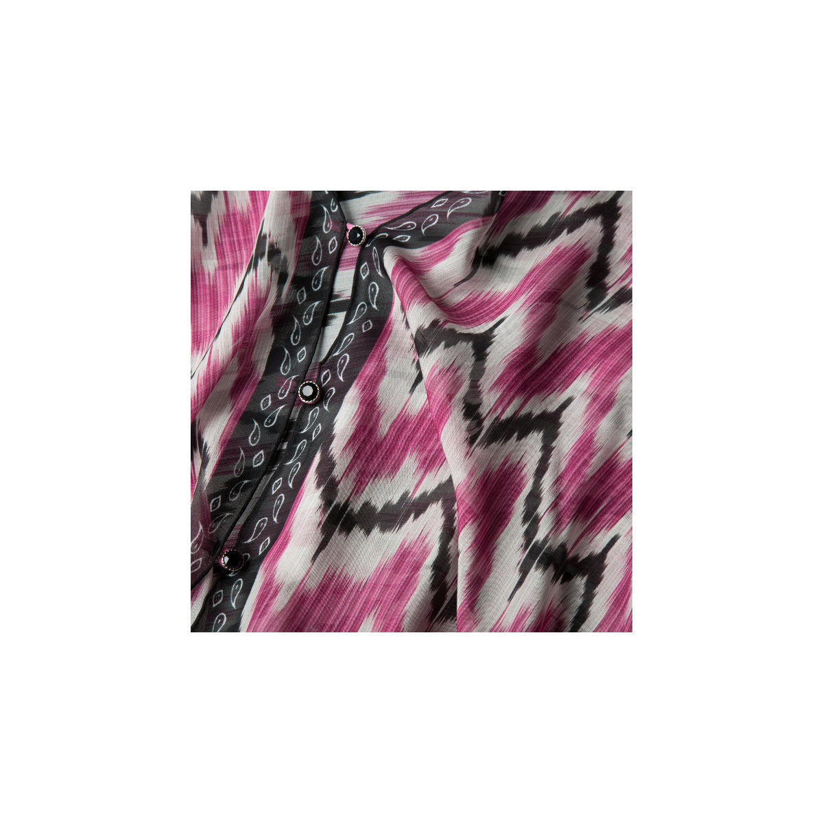 Fabric with pink, black, and white pattern on a white background