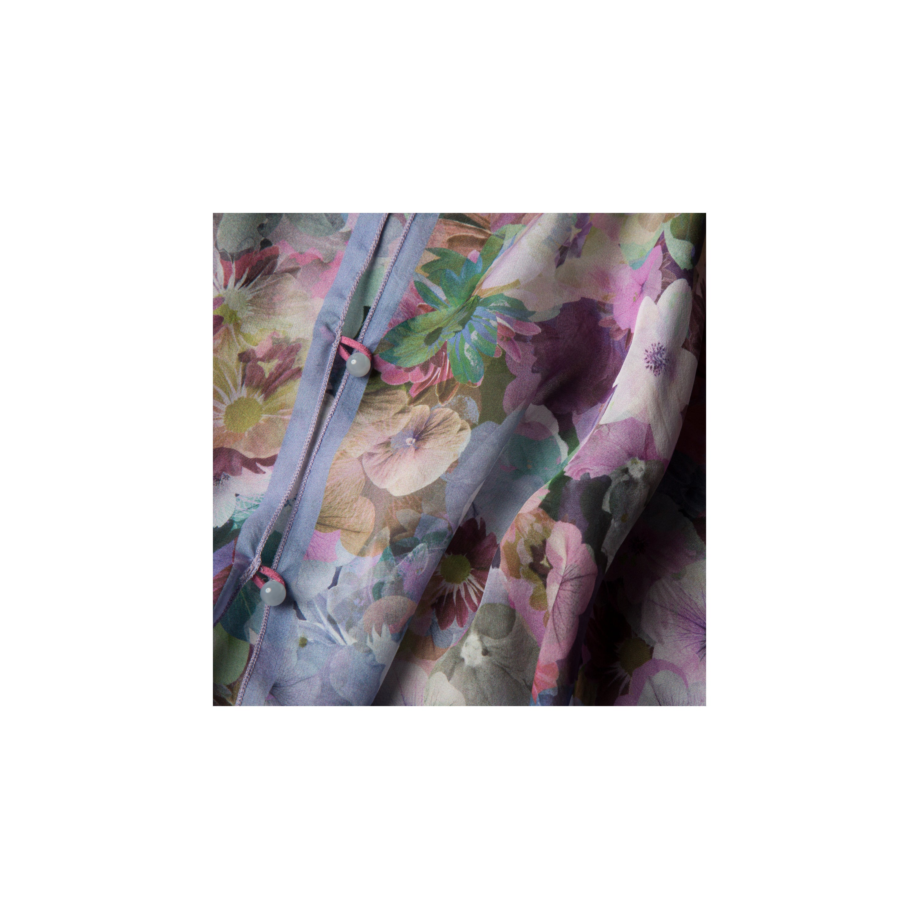 Floral patterned fabric with a focus on texture and color.